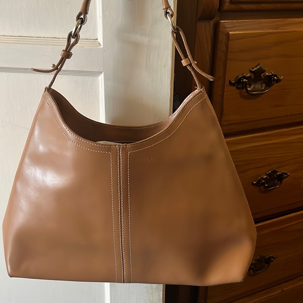 Furla Bag, inside no callouts clean. Outside call outs on corners.Nice!!